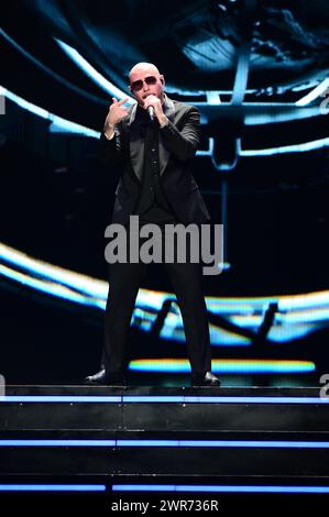 Hollywood, USA. 08th Mar, 2024. HOLLYWOOD, FLORIDA - MARCH 08: Pitbull performs live on stage during The Trilogy Tour at Amerant Bank Arena on March 08, 2024 in Sunrise, Florida. (Photo by JL/Sipa USA) Credit: Sipa USA/Alamy Live News Stock Photo