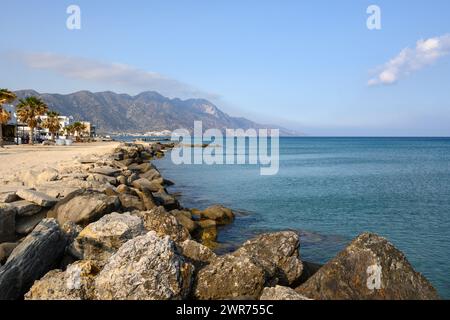 Rocky coast on the beach in Kardamena resort. Kos island, Greece Stock Photo