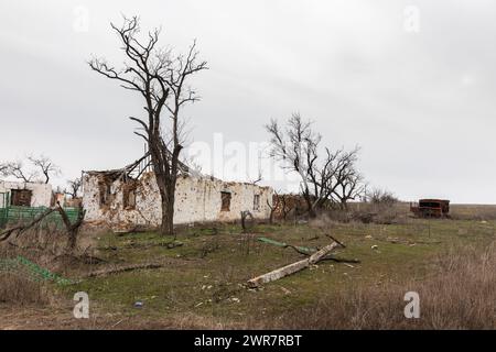 Mykolaiv Region, Ukraine. 02nd Mar, 2024. A house of a local resident seen destroyed by Russian military action and regular missile attacks are seen in a village in Mykolaiv region. A typical scene of a Ukrainian villages in Mykolaiv region, as in other regions of Ukraine after the occupation and near the front line. Regular shelling and destroyed houses of local residents. Credit: SOPA Images Limited/Alamy Live News Stock Photo