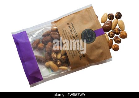 Chocolate Hazelnut & Mixed Nut Selection from M&S opened with contents spilled spilt isolated on white background Stock Photo