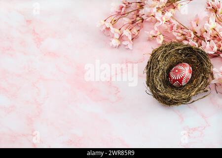 Red Easter egg on marble background. Happy Easter Stock Photo
