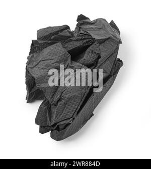 Crumpled black paper napkin - unused, isolated on white Stock Photo