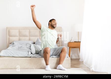 Images Of Well Rested Happy well-rested man stretching smiling after good resting standing ...
