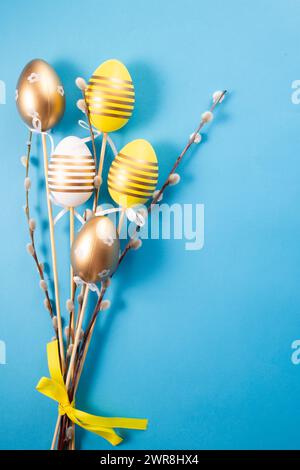 Easter eggs on blue background. Greetings card, Happy Easters. Flat lay ,top view Stock Photo