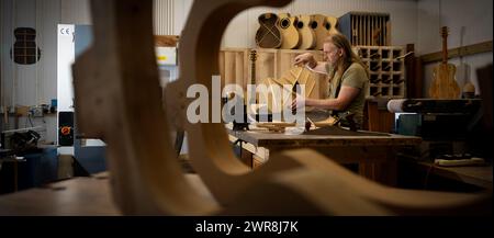 15/02/24  Rob Hodgson, 40, makes guitars in his workshop in Idridgehay, Near Wirksworth, Derbyshire.  Full story:  https://docs.google.com/document/d/ Stock Photo