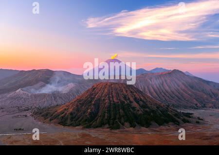 Aerial view of Mount Semeru erupting with a volcanic ash plume above a ...