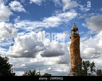 Islands of Adventure tower at Universal Orlando Resort under a blue cloudy sky. Stock Photo