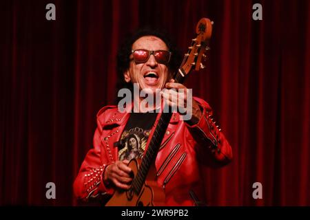 Mexican singer Alex Lora, of the band El Tri performs at the half