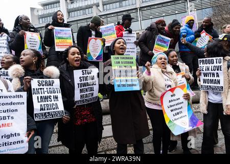 London, UK. 11th Mar, 2024. Protestors from Out & Proud African LGBTI demonstrate for LGBT rights outside Westminster Abbey, they chants 'Shame on commonwealth'. Anti-monarchy and Pro-LGBT protesters assembled and demonstrated outside Westminster Abbey, while the members of the royal family and other guests arrive for the Commonwealth Day Service. Credit: SOPA Images Limited/Alamy Live News Stock Photo