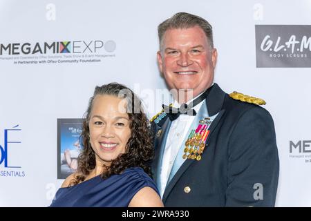 Los Angeles, USA. 10th Mar, 2024. Col. Arnold V Strong with wife Jessica attends The 2024 Annual Suzanne Delarentiis Gala, Luncheon And Gifting Suite honoring our veterans and Celebrating The 96th Oscars at Luxe Sunset Blvd Hotel, Los Angeles, CA, March 10, 2024 Credit: Eugene Powers/Alamy Live News Stock Photo