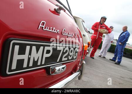 04/09/11 ..Three of the original minis from The Italian Job have had their first ever public showing today.  ..After bidding £6000 for three boxes of Stock Photo