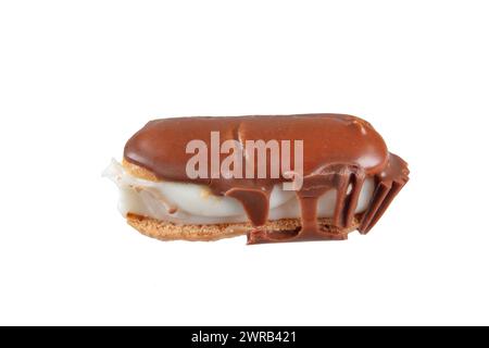 Eclairs with chocolate topping on serving plate. Traditional french eclairs with chocolate. Mini vanilla eclairs with chocolate frosting. Stock Photo