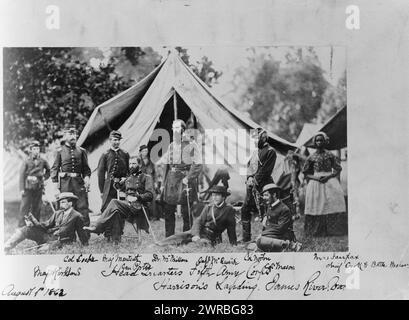 Headquarters Fifth Army Corps, Harrison's Landing, James River, Va., Nine soldiers and an African American cook posed in front of tent., August 8?, 1862., African Americans, Employment, Virginia, Harrisons Landing, 1860-1870, Group portraits, 1860-1870., Portrait photographs, 1860-1870, Group portraits, 1860-1870, 1 photographic print: printing out paper print Stock Photo