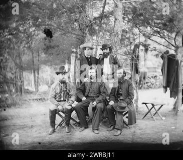 Harrison's Landing, Va. Group of the Irish Brigade, Photo shows: (back row) Patrick Dillon, unidentified; and (front row, left to right) unidentified, James Dillon, and William Corby. The identified men are priests of the Congregation of the Holy Cross, University of Notre Dame., Photograph from the main eastern theater of war, the Peninsular Campaign, May-August 1862., Gardner, Alexander, 1821-1882, photographer, 1862 July., United States, History, Civil War, 1861-1865, Military personnel, Glass negatives, 1860-1870, Stereographs, 1860-1870, 1 negative: glass, stereograph, wet collodion Stock Photo