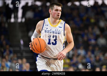 South Dakota State Jackrabbits forward Luke Appel (13) brings the ball up the court during an NCAA men's basketball semi-final between the University of St. Thomas-Minnesota Tommies and the South Dakota State Jackrabbits during the Summit League Championships at the Denny Sanford PREMIERE Center in Sioux Falls, SD on Monday, March 11, 2024. Russell Hons/CSM (Credit Image: © Russell Hons/Cal Sport Media) Stock Photo