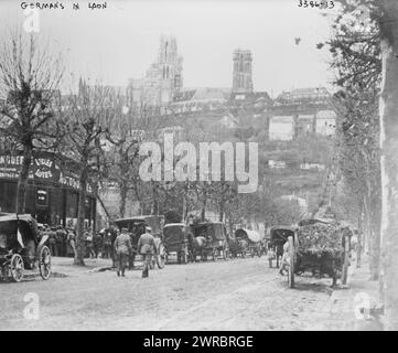 Germans in Laon, Photograph shows German soldiers with horse drawn wagons in Laon, France during World War I. Laon Cathedral is in the background., between 1914 and ca. 1915, World War, 1914-1918, Glass negatives, 1 negative: glass Stock Photo