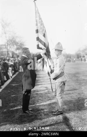 Prof. H. G. Osborn 'Old Glory', Photograph shows geologist, paleontologist and eugenist Henry Fairfield Osborn (1857?-1935), who served as President of the American Museum of Natural History, with a soldier holding an American flag., between ca. 1915 and ca. 1920, Glass negatives, 1 negative: glass Stock Photo