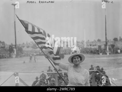 Mabel Riegelman with Old Glory, Photograph shows American soprano Mabel Riegelman holding the flag at the Lewisohn Stadium of the College of the City of New York, where she sang the 'Star Spangled Banner' and 'Dixie' during a program on June 22, 1917., 1917 June 22, Glass negatives, 1 negative: glass Stock Photo