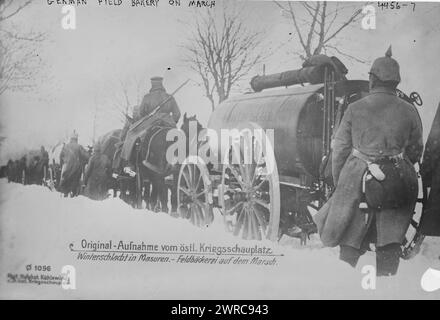 German field bakery on march, Photograph shows a German field bakery with soldiers marching during the Winter Battle of the Masurian Lakes in 1915 on the Eastern Front during World War I., 1915, World War, 1914-1918, Glass negatives, 1 negative: glass Stock Photo