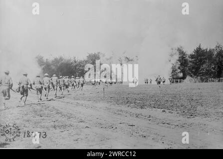 336th Inf. charging enemy, Photograph shows American soldiers practicing throwing hand grenades at enemy positions in Choloy, France, August 1, 1918 during World War I., 1918 Aug. 1, World War, 1914-1918, Glass negatives, 1 negative: glass Stock Photo