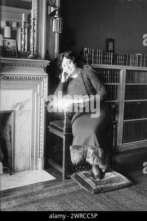 Matzenauer, Photograph shows mezzo-soprano opera singer Margaret Matzenauer (Margarete Matzenauer or Margarethe Matzenaur) (1881-1963) seated by fireplace., between ca. 1915 and ca. 1920, Glass negatives, 1 negative: glass Stock Photo