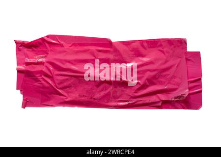 Layered pink plastic tapes isolated on white background with clipping path Stock Photo