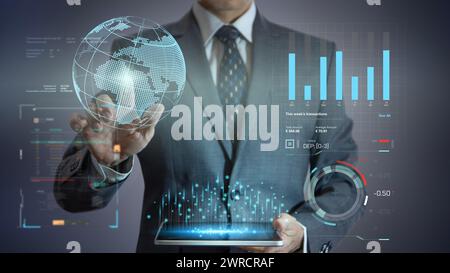 Businessman interacting with modern digital virtual dashboards for business data analysis. Stock Photo