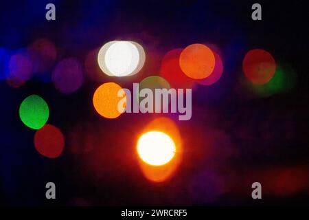 Abstract colored lights - out of focus color lights on airport runway - blurry fuzzy out-of-focus round lighting Stock Photo