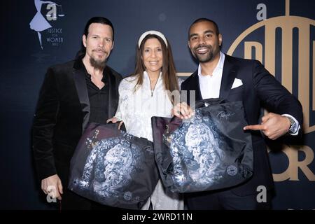 Beverly Hills, USA. 10th Mar, 2024. American news anchor Christine Devine, Actor Sean McNabb, Actor Amir Tyson with a bags designed by Robert Pho attend Children Uniting Nations 24th Annual Academy Awards Celebration and Oscars Viewing Dinner at The Historic Warner Bro. Estate, Los Angeles, CA, March 10, 2024 Credit: Eugene Powers/Alamy Live News Stock Photo