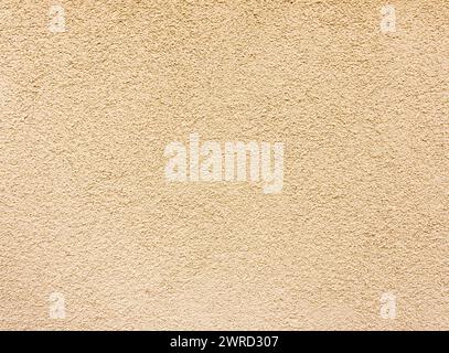 Textured beige plaster. Background Stock Photo