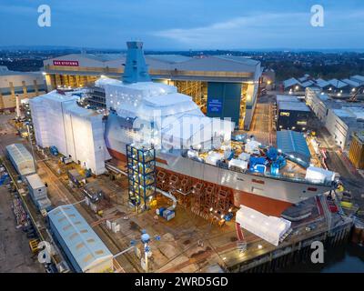 Glasgow,  Scotland, UK. 11th March, 2024. HMS Cardiff seen under construction at BAE Systems shipyard on the River Clyde at Govan Glasgow. HMS Cardiff is the second Type 26 frigate to be built for the Royal Navy. Stock Photo