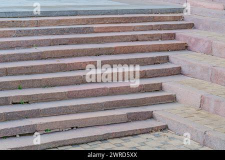 The view of the staircase in the outdoors. Type of concrete steps, texture of steps. Going up. Travel scene. Stock Photo