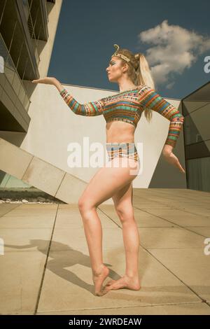 Fitness beauty in costume of Egypt princess posing outdoor Stock Photo