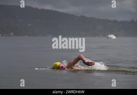 29/08/15  Kevin Welsh completes his swim at Ambleside.  Competitors take part in the annual 10.5 mile swim along the length of Lake Windermere (Britai Stock Photo