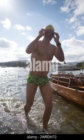 29/08/15  Kevin Welsh completes his swim at Ambleside.  Competitors take part in the annual 10.5 mile swim along the length of Lake Windermere (Britai Stock Photo