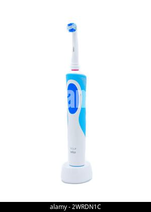 Electric toothbrush standing upright isolated on a white background Stock Photo