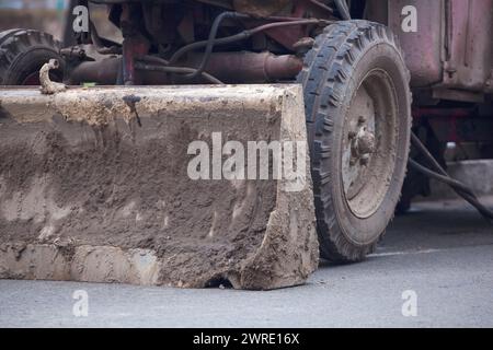 Blade on a tractor standing in the street close up. Stock Photo