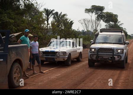 10/10/15.  A Ford Mustang from Atlantic to Pacific on the Tranz Amanonica Highway in the Amazon rainforest  - thought to be the first car of its type Stock Photo