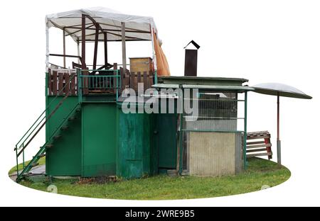 Homemade shed made of metal, wood and canvas. Isolated on white Stock Photo