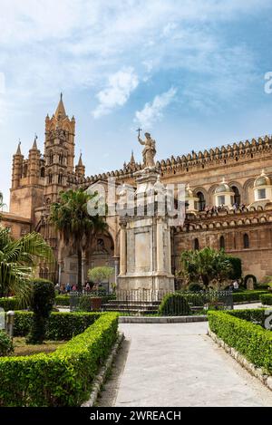Palermo, Italy - May 13, 2023: Facade of the cathedral of Palermo with people around in the old town of Palermo, Sicily, Italy Stock Photo