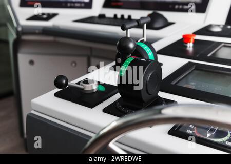 Azimuth thruster control levers,  equipment of a tug boat control panel. Marine navigation simulation system Stock Photo