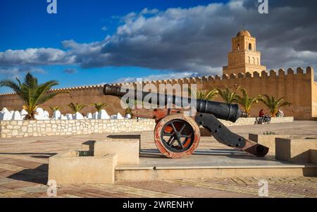The antique Ramadan cannon used to announce the end of the daily fast next to the Great Mosque of Kairouan, or Mosque of Uqba, in Kairouan, Tunisia. T Stock Photo