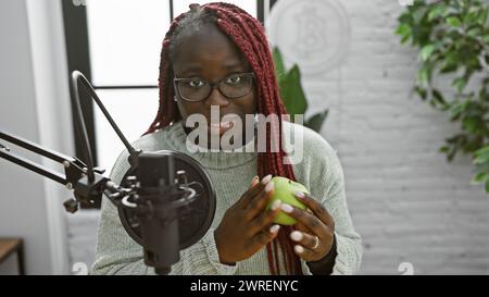 African American Content Producer In Eyeglasses Holding Exposure Meter 