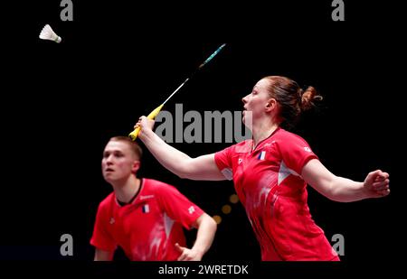 France's Thom Gicquel (left) and Delphine Delrue in their Mixed Doubles match against Malaysia's Tan Kian Meng and Lai Pei Jing on day one of the YONEX All England Open Badminton Championships at the Utilita Arena Birmingham. Picture date: Tuesday March 12, 2024. Stock Photo