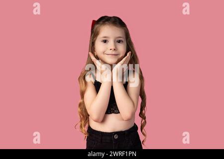 Close-up portrait of her she nice-looking attractive lovely sweet dreamy cheerful cheery girl fantasizing copy empty blank place space isolated pink p Stock Photo
