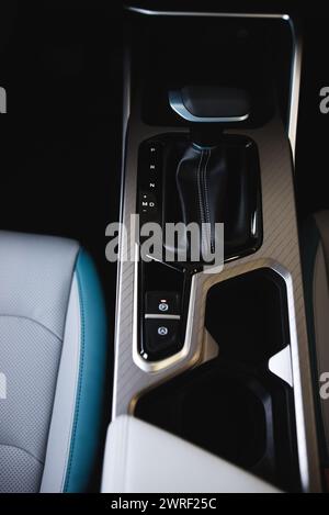 Automatic transmission gearshift stick, Closeup a manual shift of modern car gear shifter Stock Photo