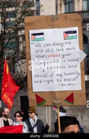 Pro Palestine protest march in London, UK, protesting against the conflict in Gaza and against Israel occupation. James Baldwin oppression quote Stock Photo