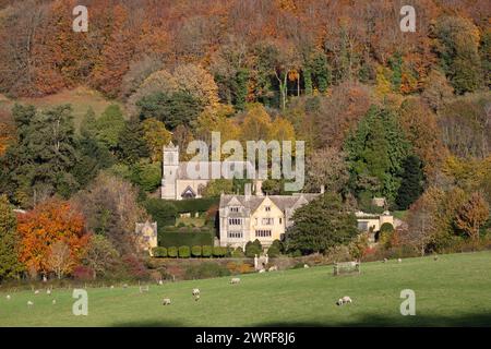 Owlpen Manor and church in autumn sunlight, Owlpen, near Dursley, Cotswolds, Gloucestershire, England, United Kingdom, Europe Stock Photo