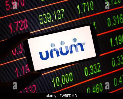 Konskie, Poland - March 11, 2024: Unum company logo displayed on mobile phone Stock Photo