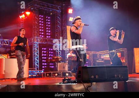 Milan Italy 30/05/2003:Thema,Strano,Grido and DJ THG, singers of Gemelli DiVersi, Italian hip pop musical group,during the music television program Festivalbar 2003 Stock Photo